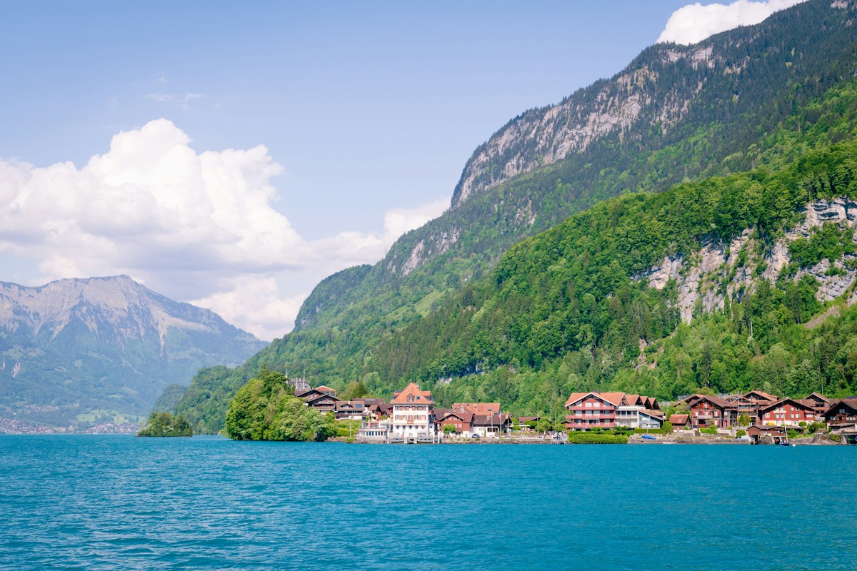 Chalets and turquoise water at Lake Brienz